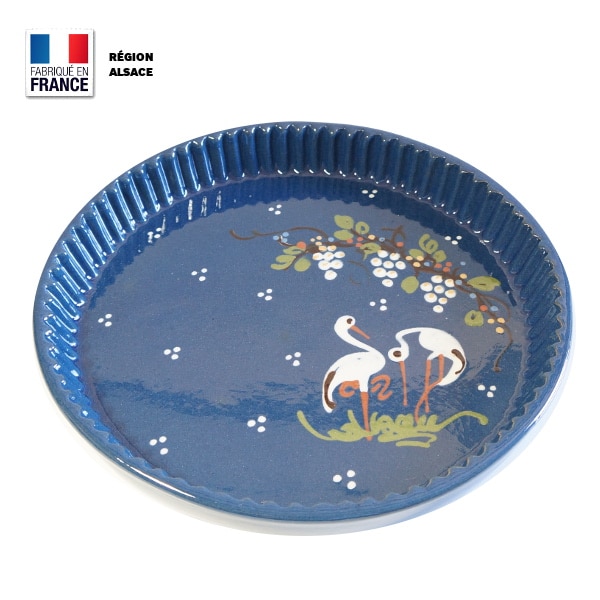 https://www.poterie.alsace/wp-content/uploads/2019/07/moule-tarte-cigogne-bleu-poterie-alsace.jpg